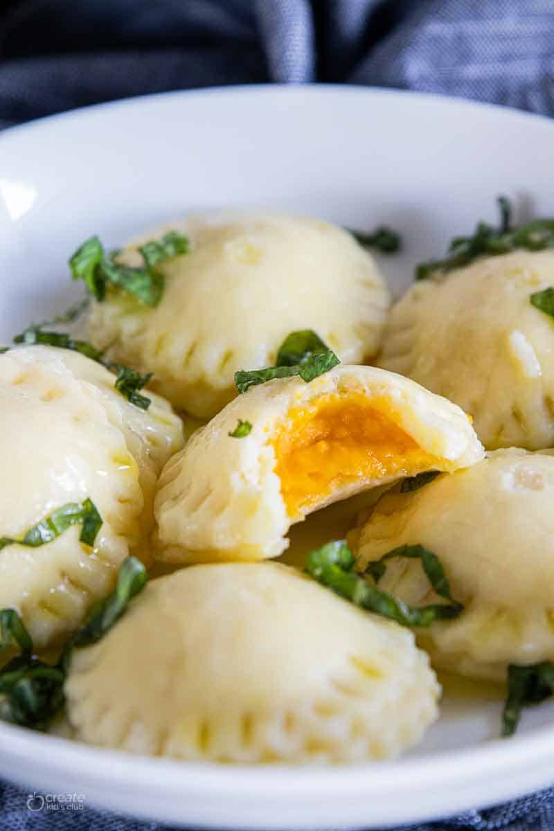 butternut squash ravioli in a serving bowl