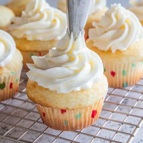 white frosting piped onto gluten free frosting