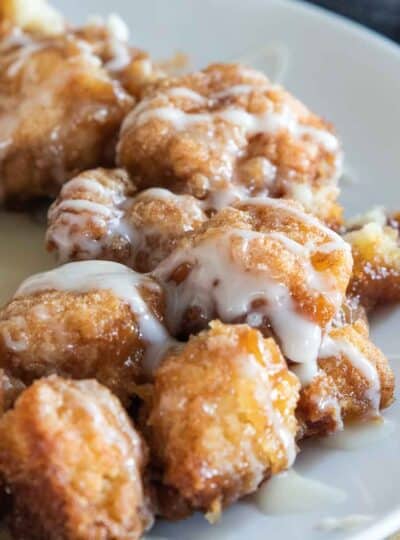 close up view of icing drizzled gf monkey bread