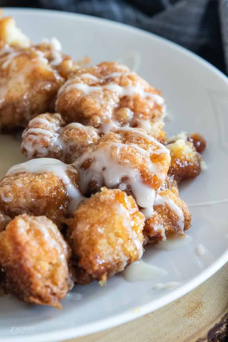 close up view of icing drizzled monkey bread