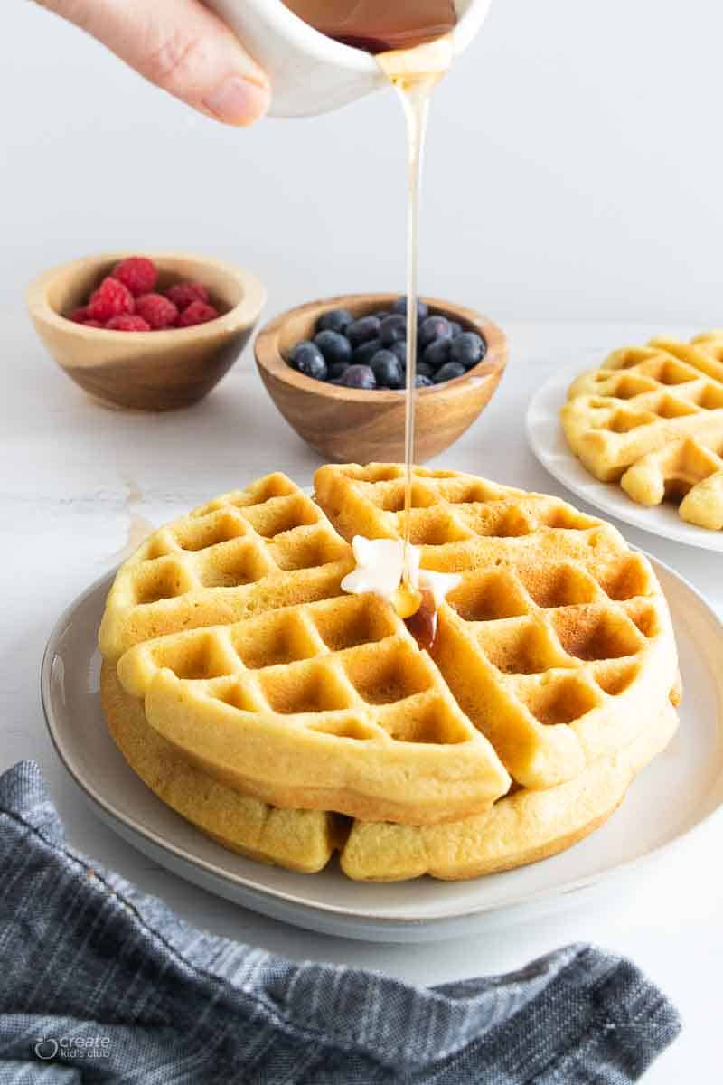 syrup drizzled over dairy free waffle