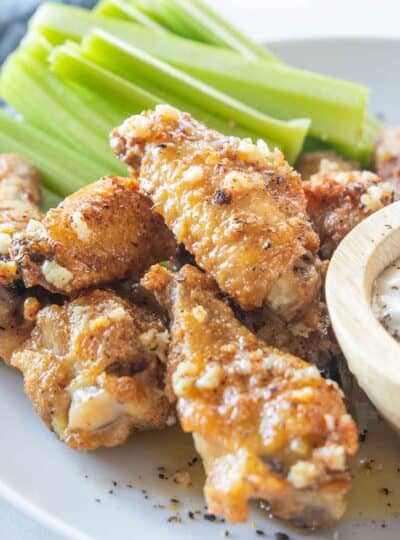 close up view of chicken wings on plate