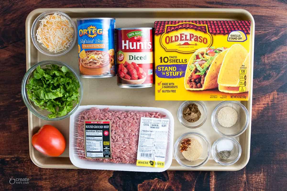 ingredients for oven baked tacos on sheet pan