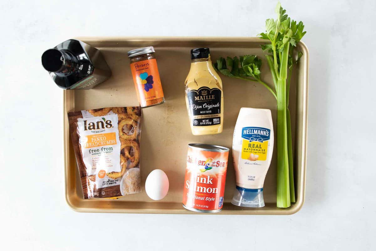 ingredients for gluten free salmon cakes on baking sheet