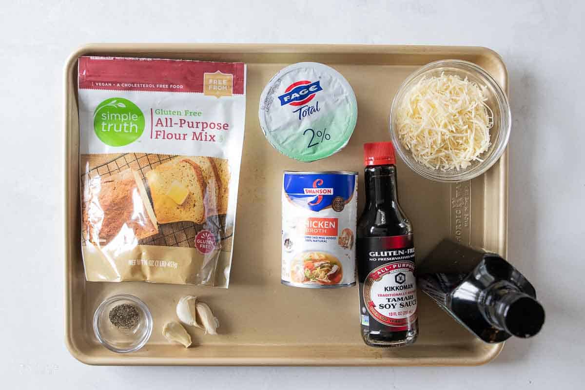 ingredients for gluten free alfredo sauce on sheet pan