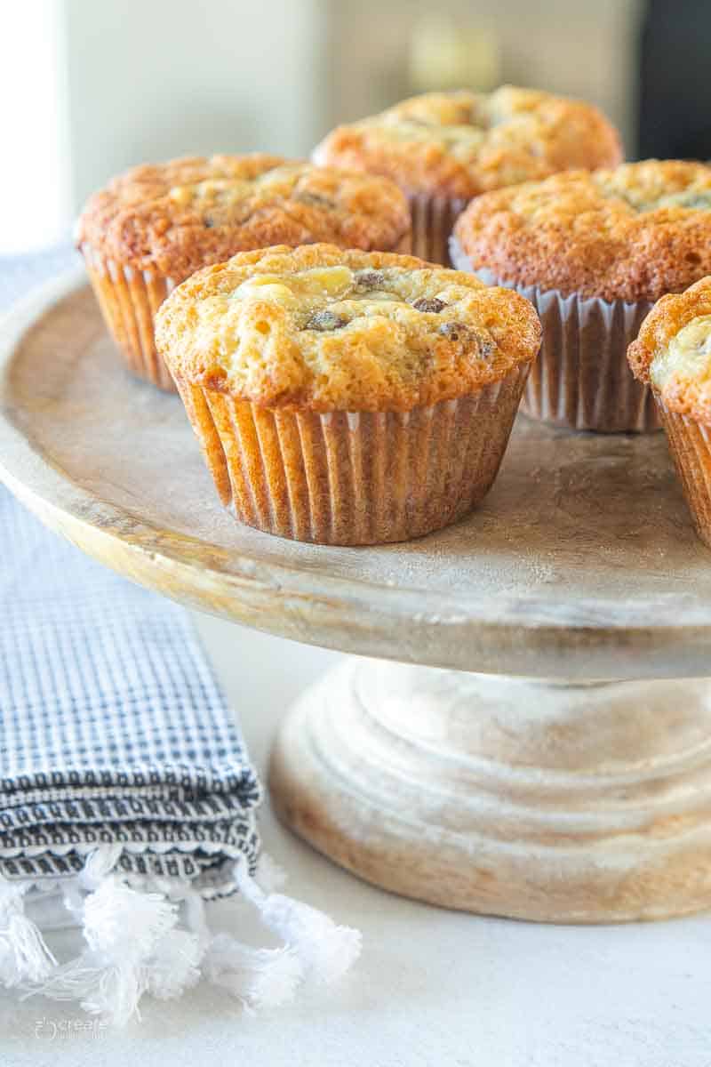 chocolate chip banana muffins on stand