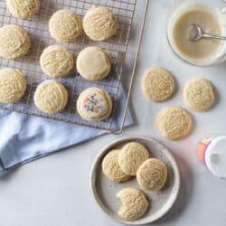 top down view of sugar cookies being iced