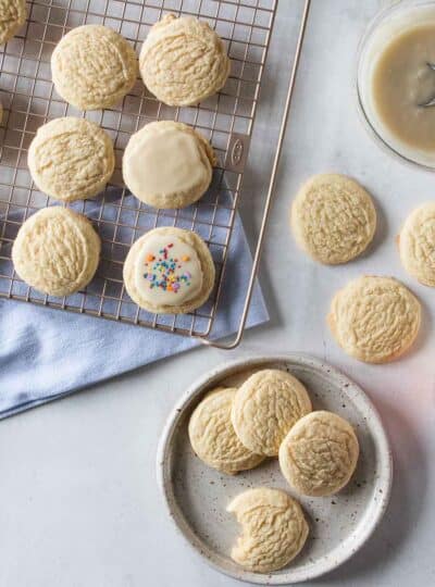 top down view of sugar cookies being iced