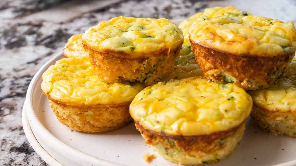 Mashed potato bites stacked on a plate.