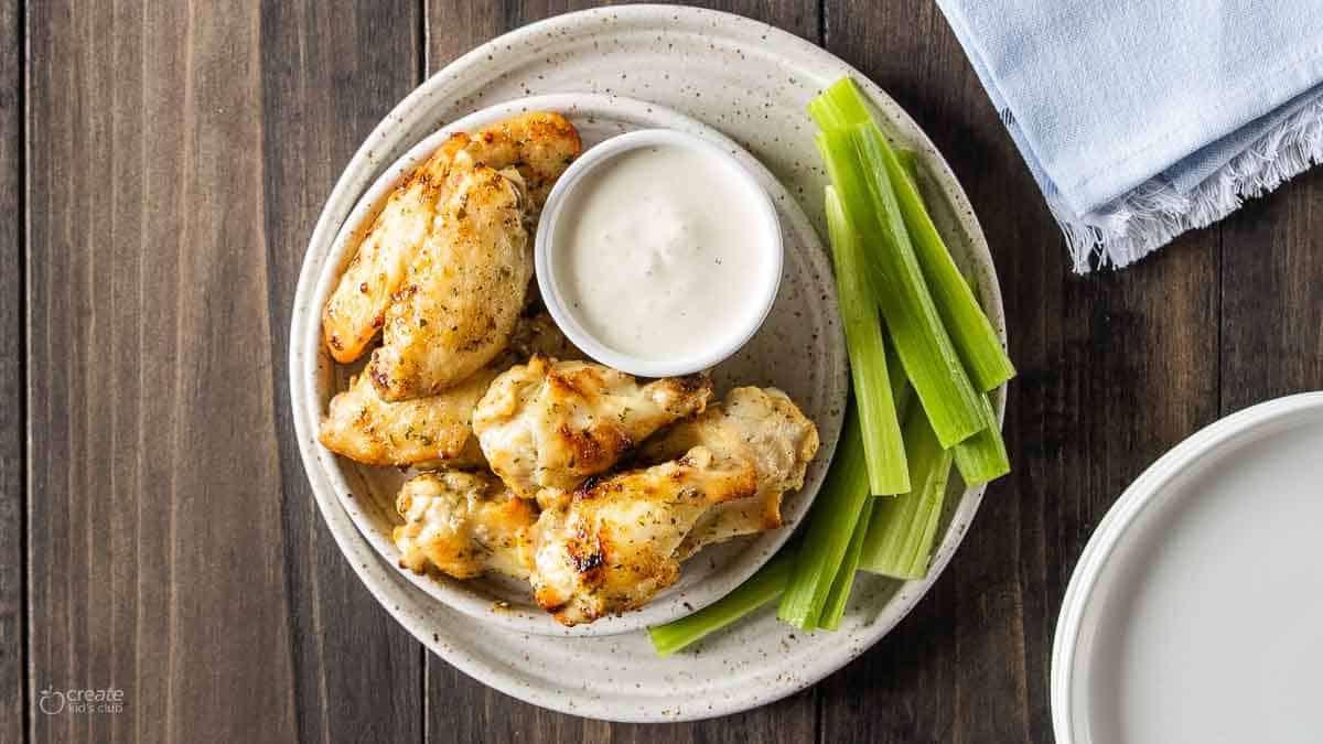 top down view of air fryer chicken wings on plate