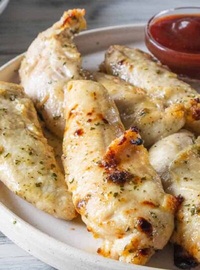 no breading chicken tenders on plate with dipping sauce