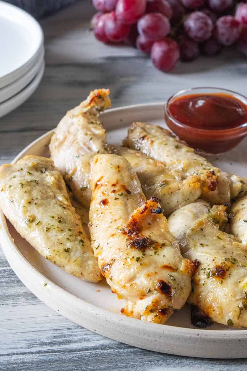 no breading chicken tenders on plate with dipping sauce