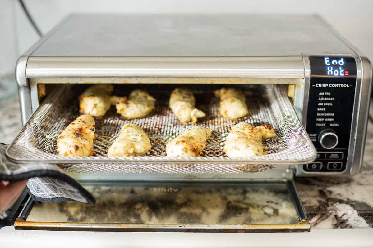 cooked chicken tenders removed from air fryer