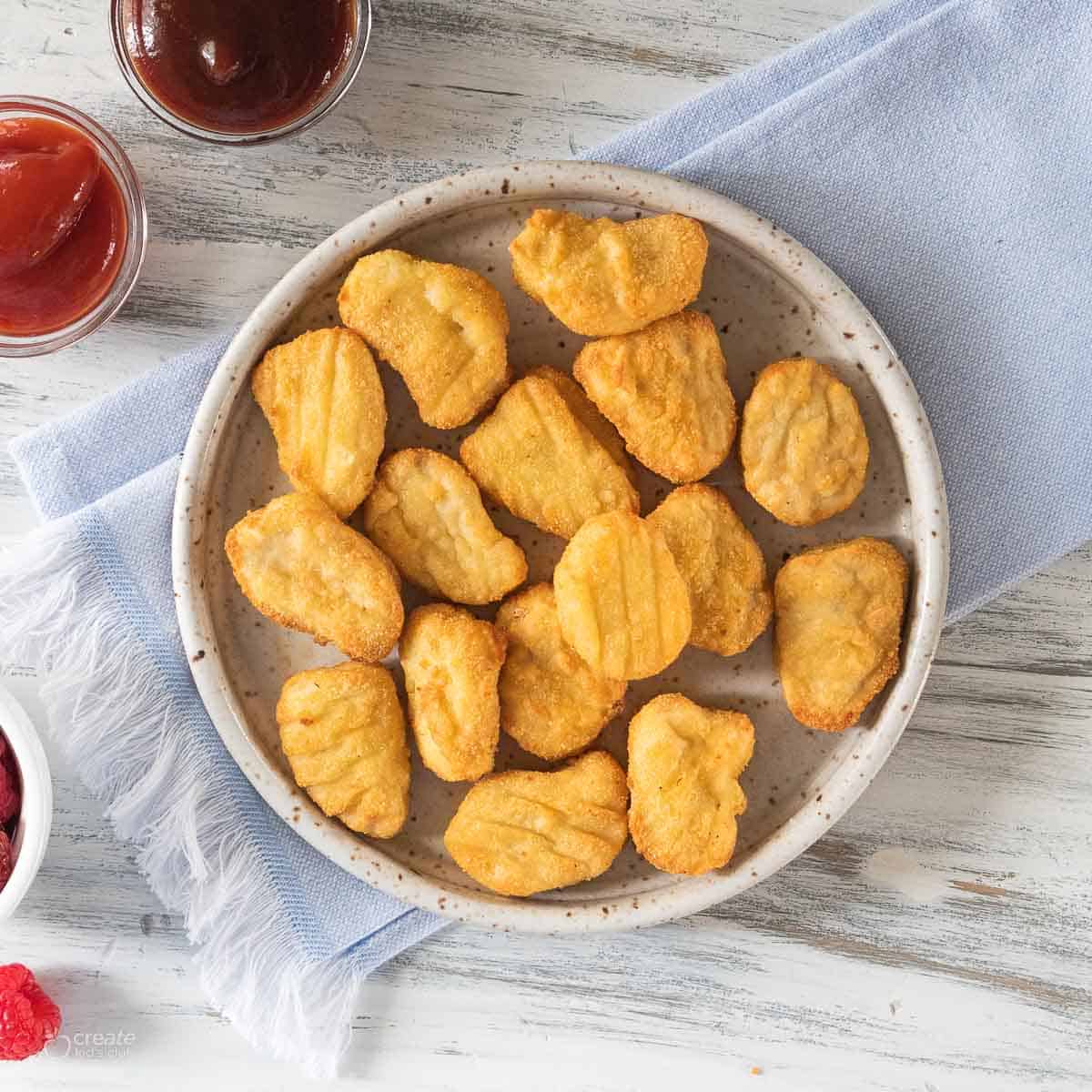 top down view of air fryer chicken nuggets