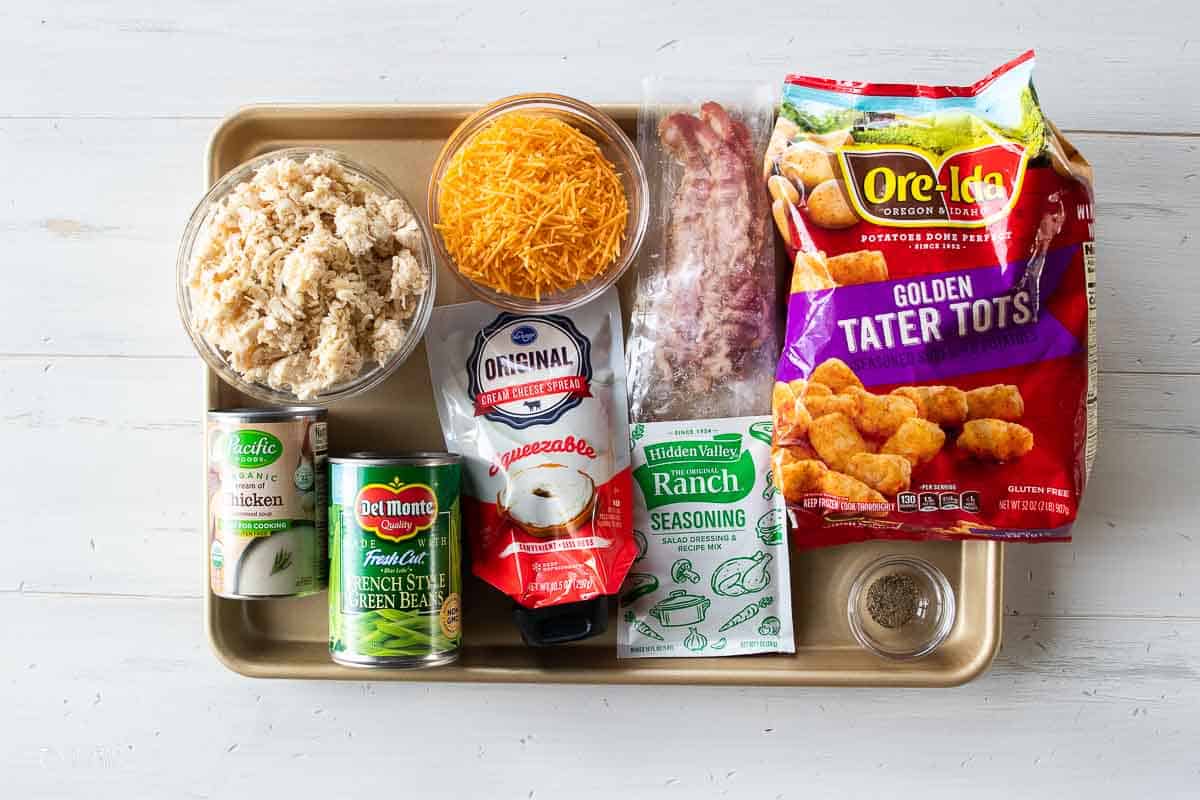 ingredients for chicken bacon ranch tater tot casserole on sheet pan