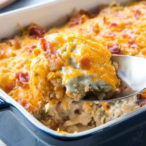 spoon scooping serving of tatertot casserole