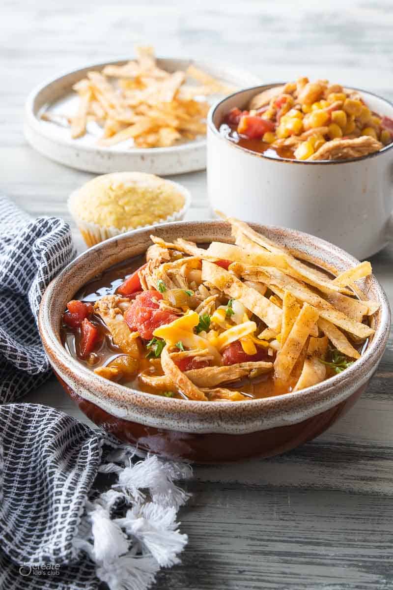 chicken soup topped with tortilla strips