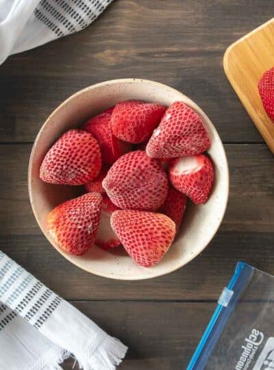 whole frozen strawberries in bowl