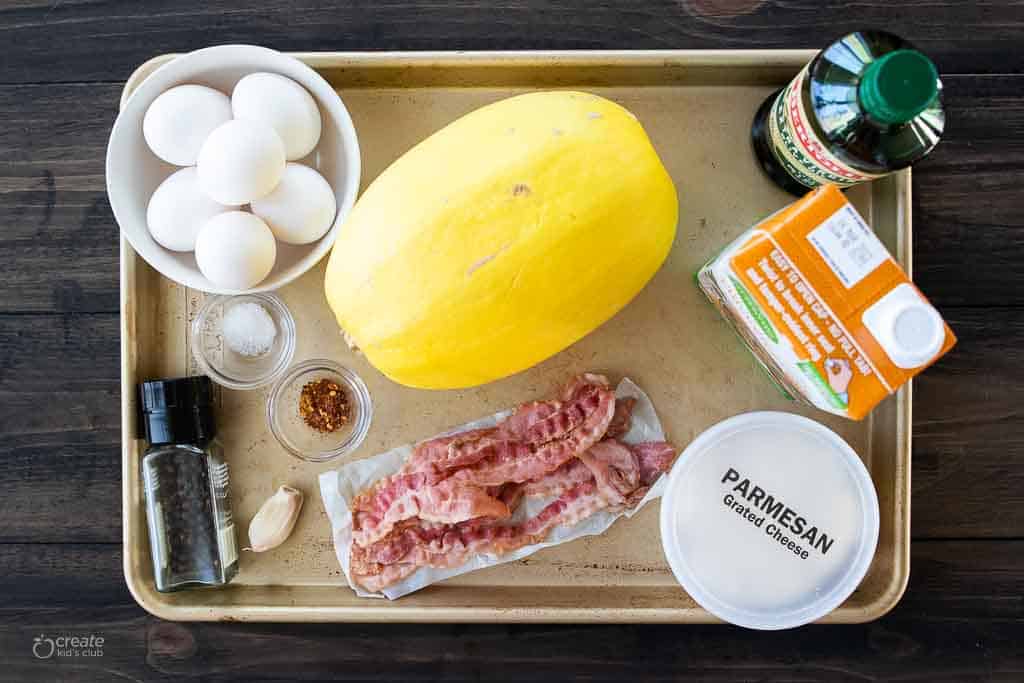 ingredients for spaghetti squash carbonara on sheet pan