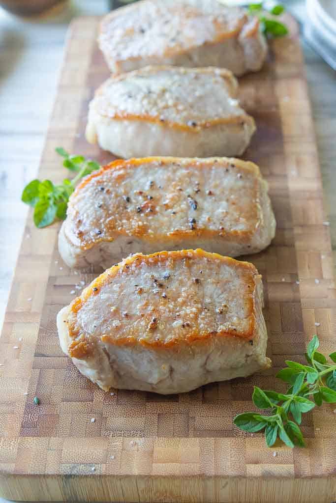 side view of pork chops on a platter