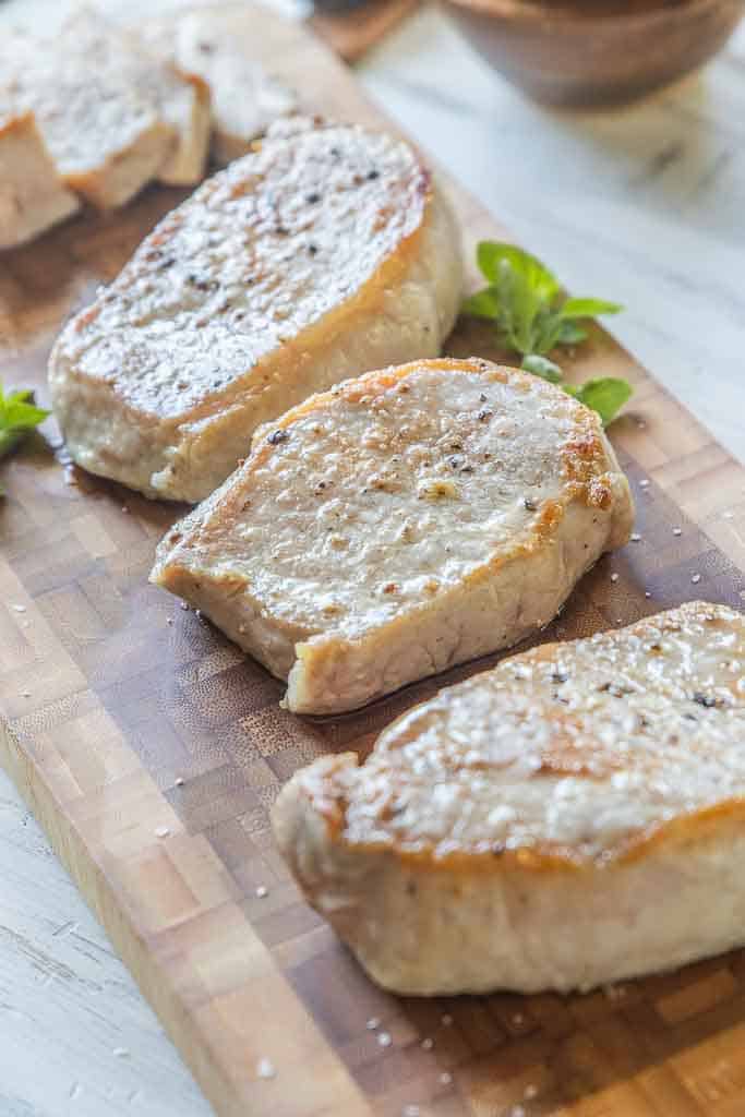 baked pork chops on a platter