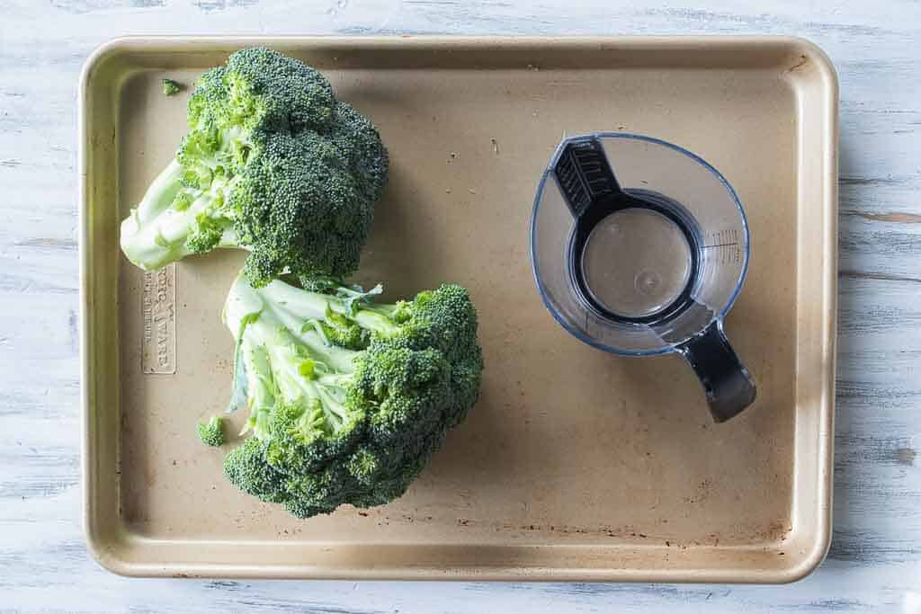 ingredients for steamed broccoli on sheet pan