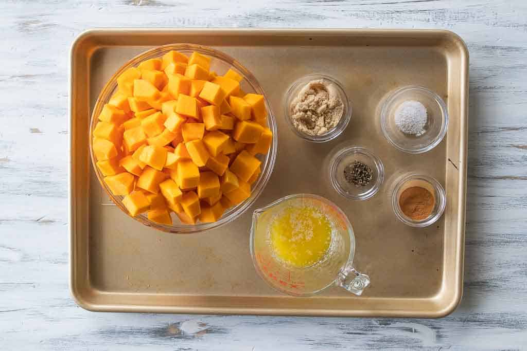 ingredients for roasted butternut squash on baking sheet