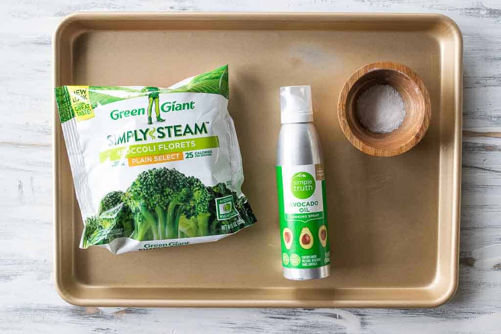 ingredients for roasted frozen broccoli on sheet pan