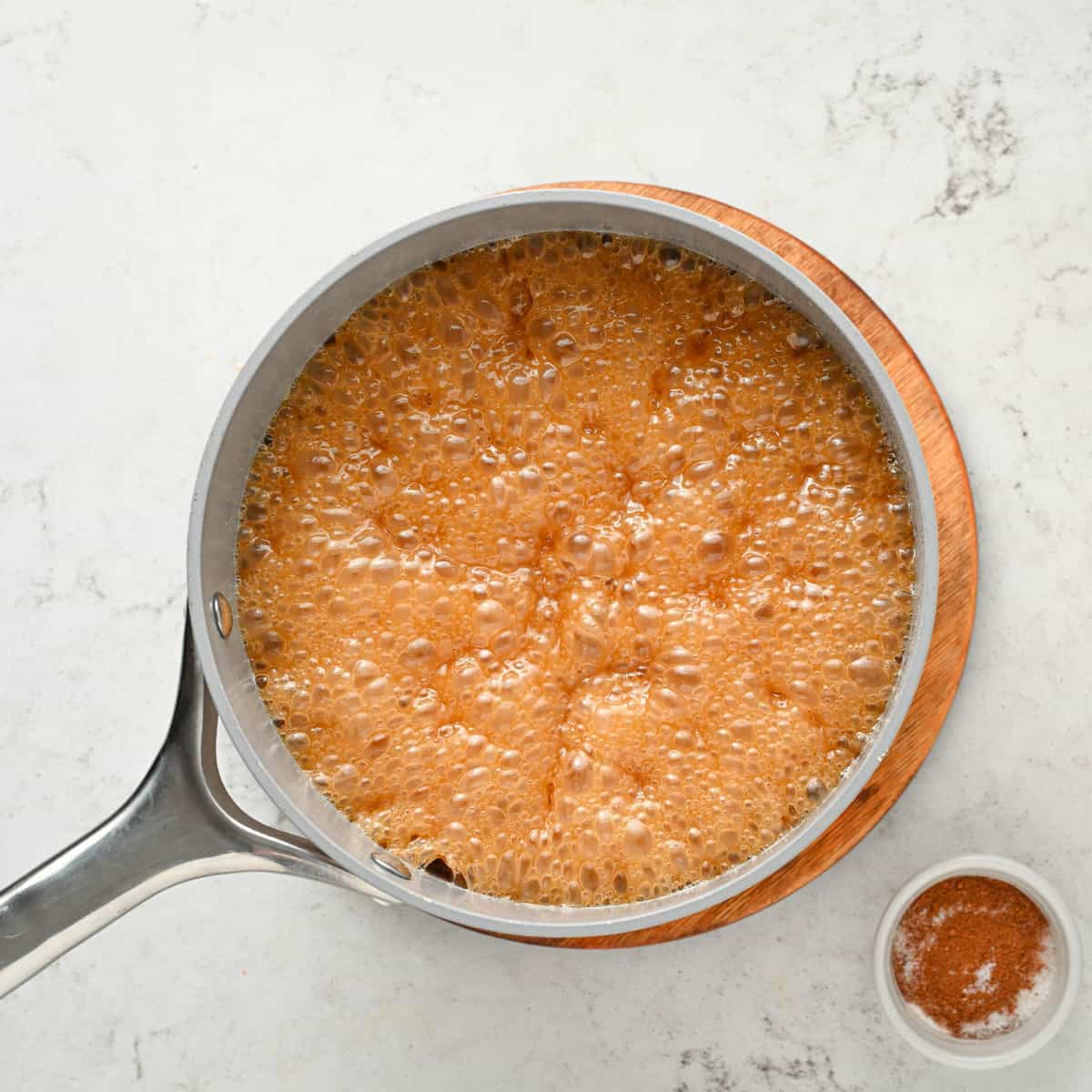 caramel sauce boiling in pot