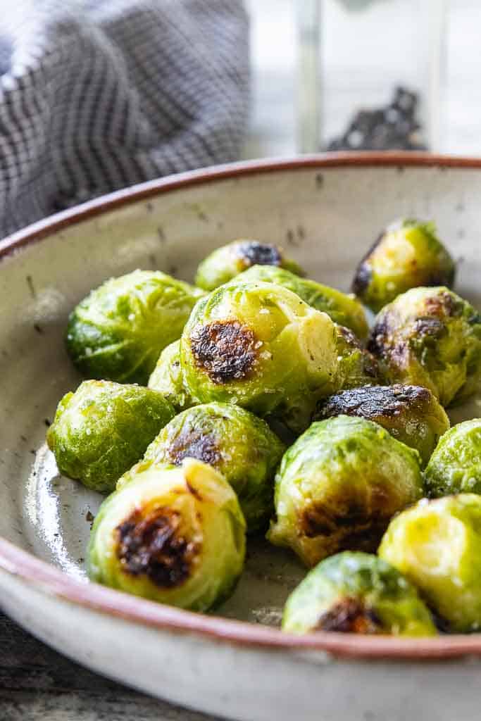 roasted brussels sprouts in a serving bowl