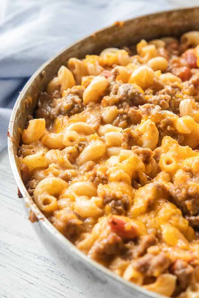 A close up of a creamy sausage Mac and cheese.