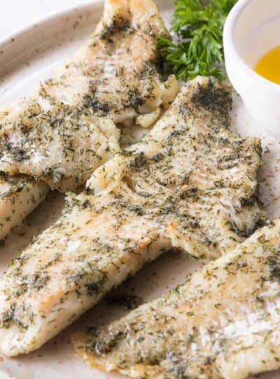 broiled haddock on serving plate