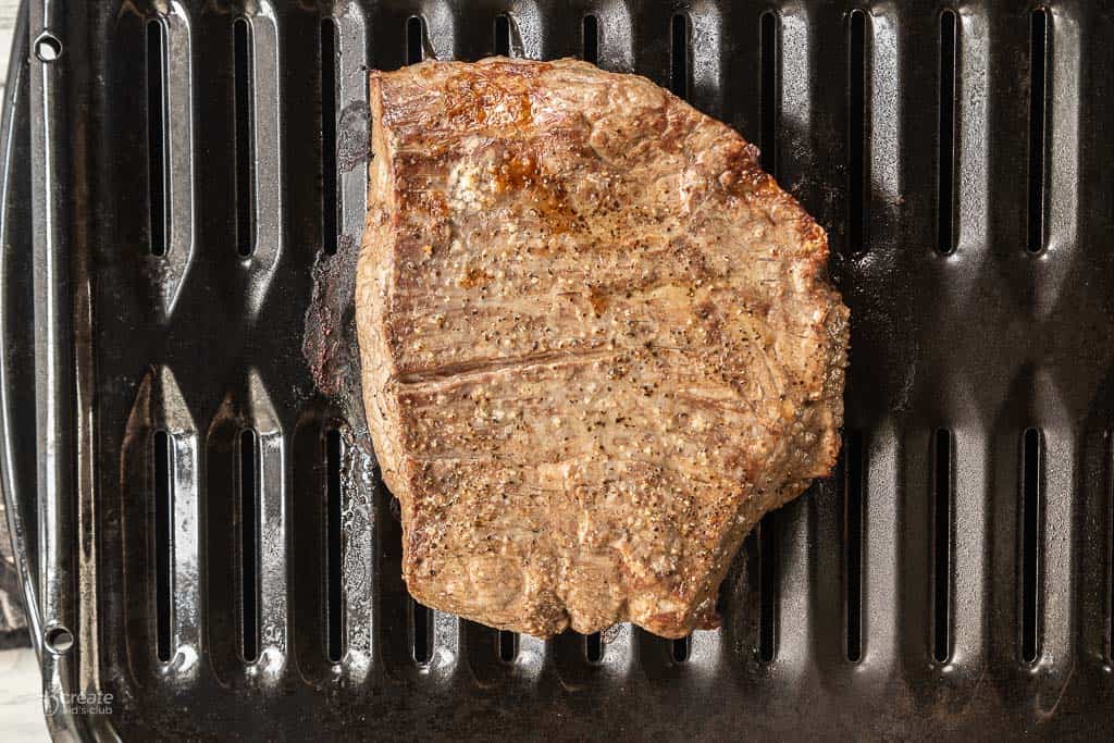 close up view of broiled flank steak