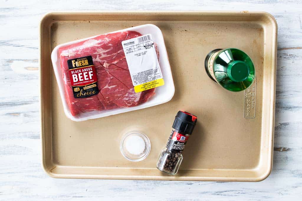 ingredients for broiled flank steak on sheet pan