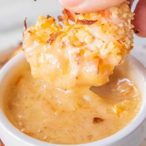 coconut shrimp dipped in dipping sauce