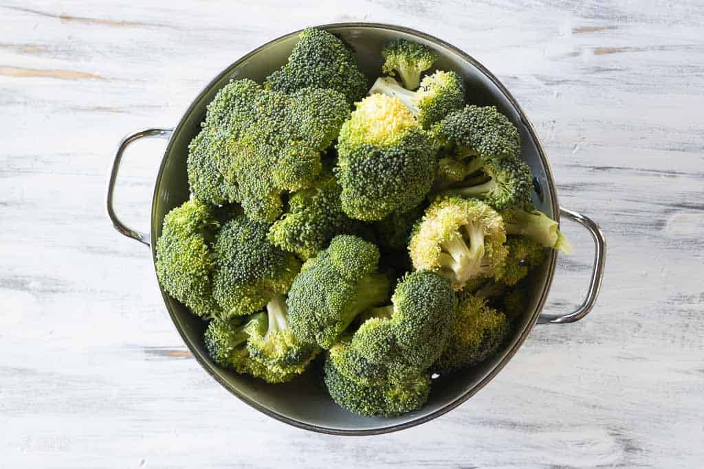 fresh broccoli in strainer