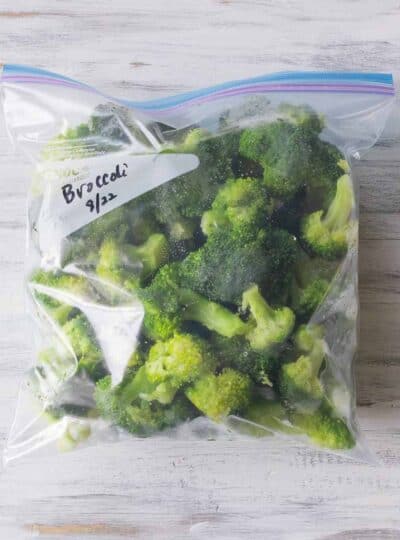 fresh broccoli florets in labeled Ziplock bag