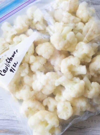 Frozen cauliflower florets in a ziplock bag.