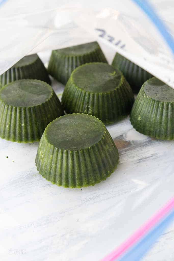 frozen spinach cups in freezer bag