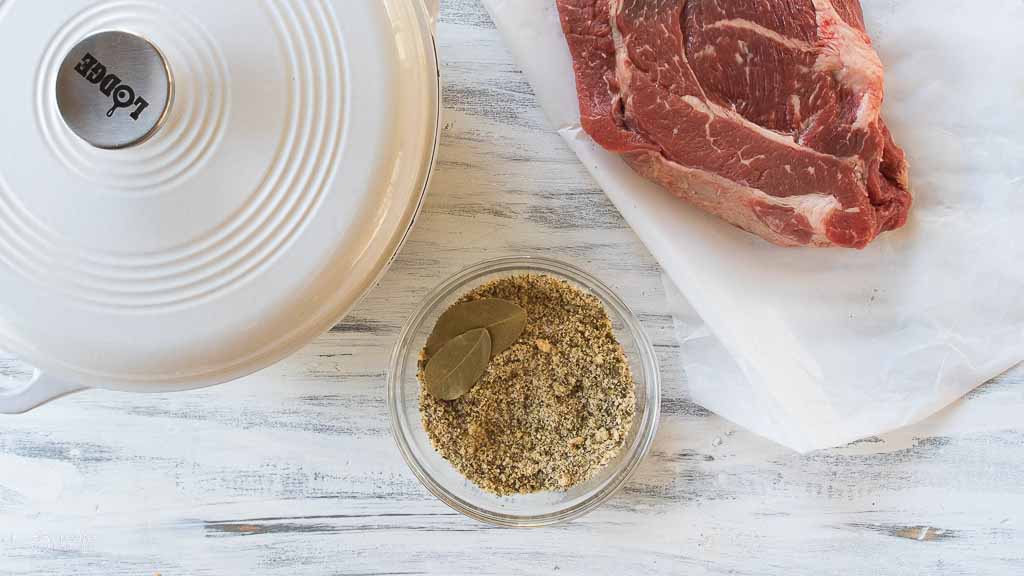 pot roast seasoning next to a chuck roast