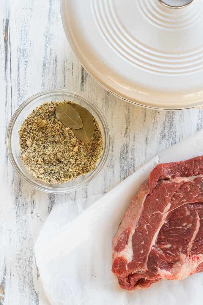 pot roast seasoning next to a chuck roast