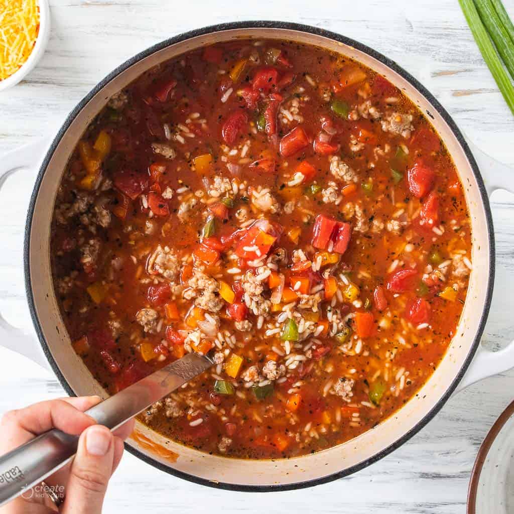 stuffed pepper soup mixed in Dutch oven pot