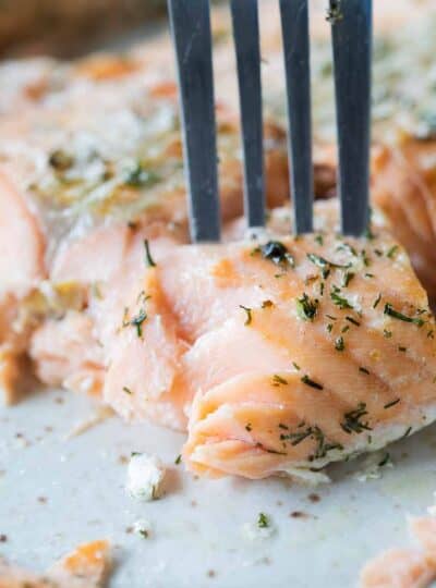 fork in bite of salmon