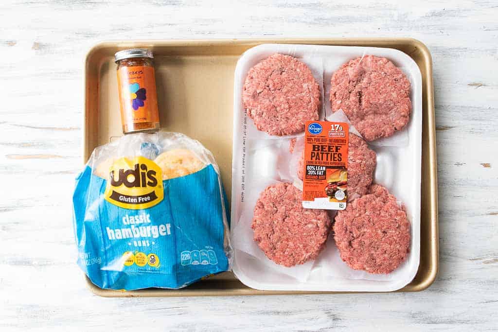 ingredients for broiled burgers on sheet pan