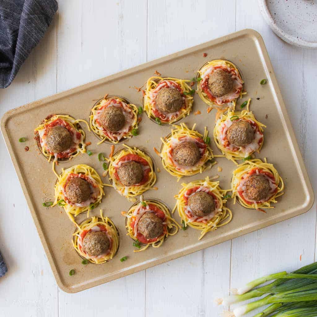 top view of spaghetti and meatball cups