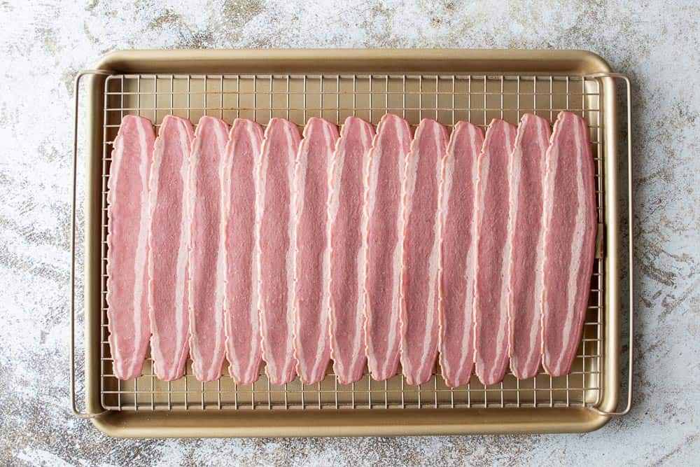 raw turkey bacon on sheet pan