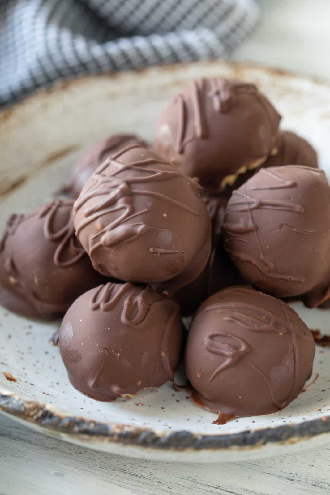 close up view of no bake peanut butter balls