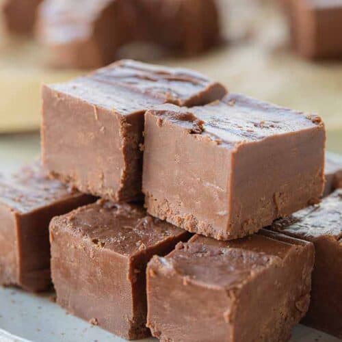 fudge pieces stacked on plate
