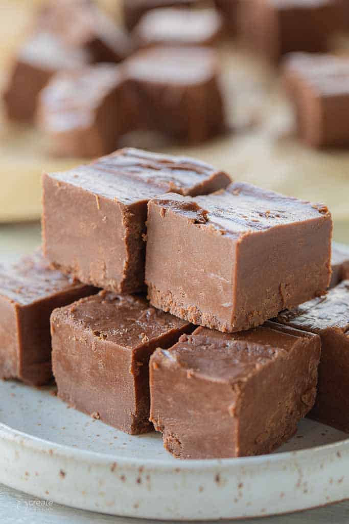 fudge pieces stacked on plate