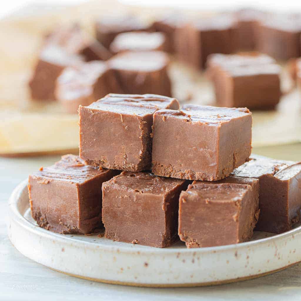 fudge pieces stacked on plate